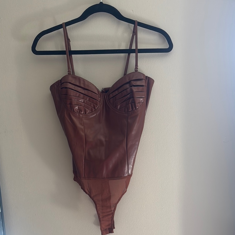 Brown woman’s One Piece